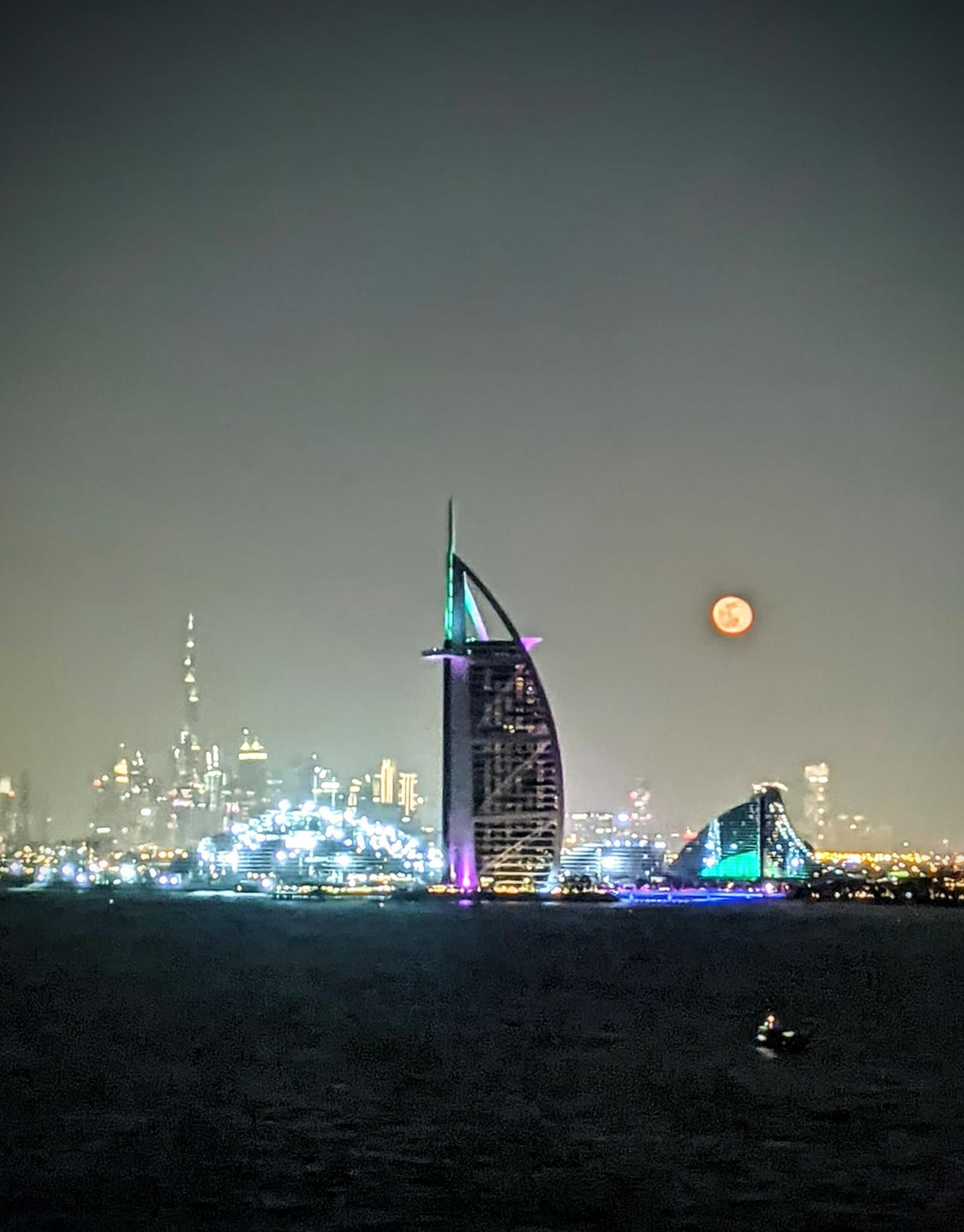 Moonset over the Burj Al Arab hotel in Dubai