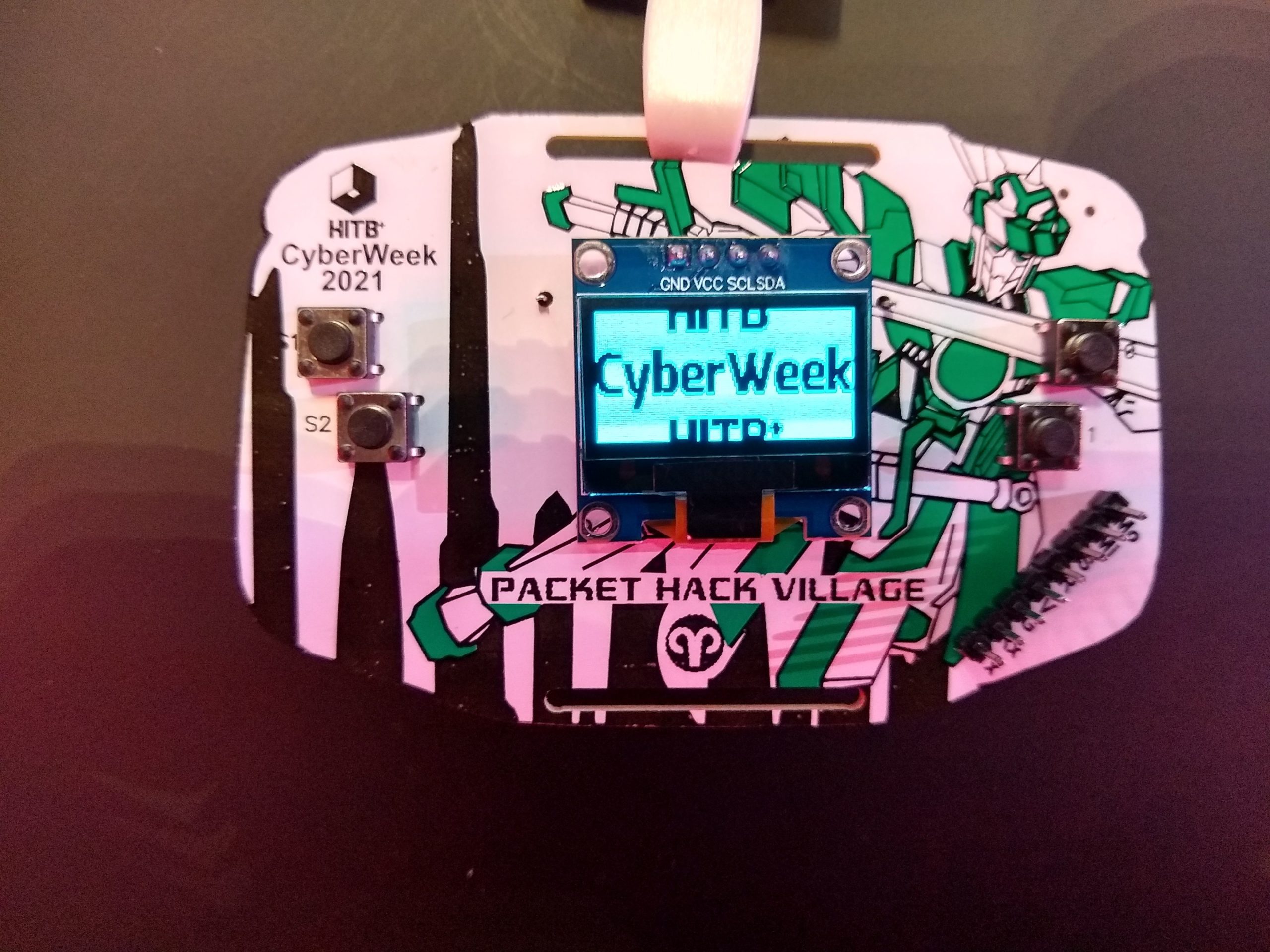 A custom electronic badge developed for the Packet Hack Village
