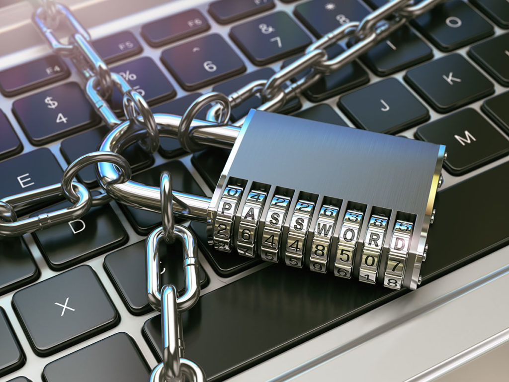 Laptop keyboard with lock and chain.