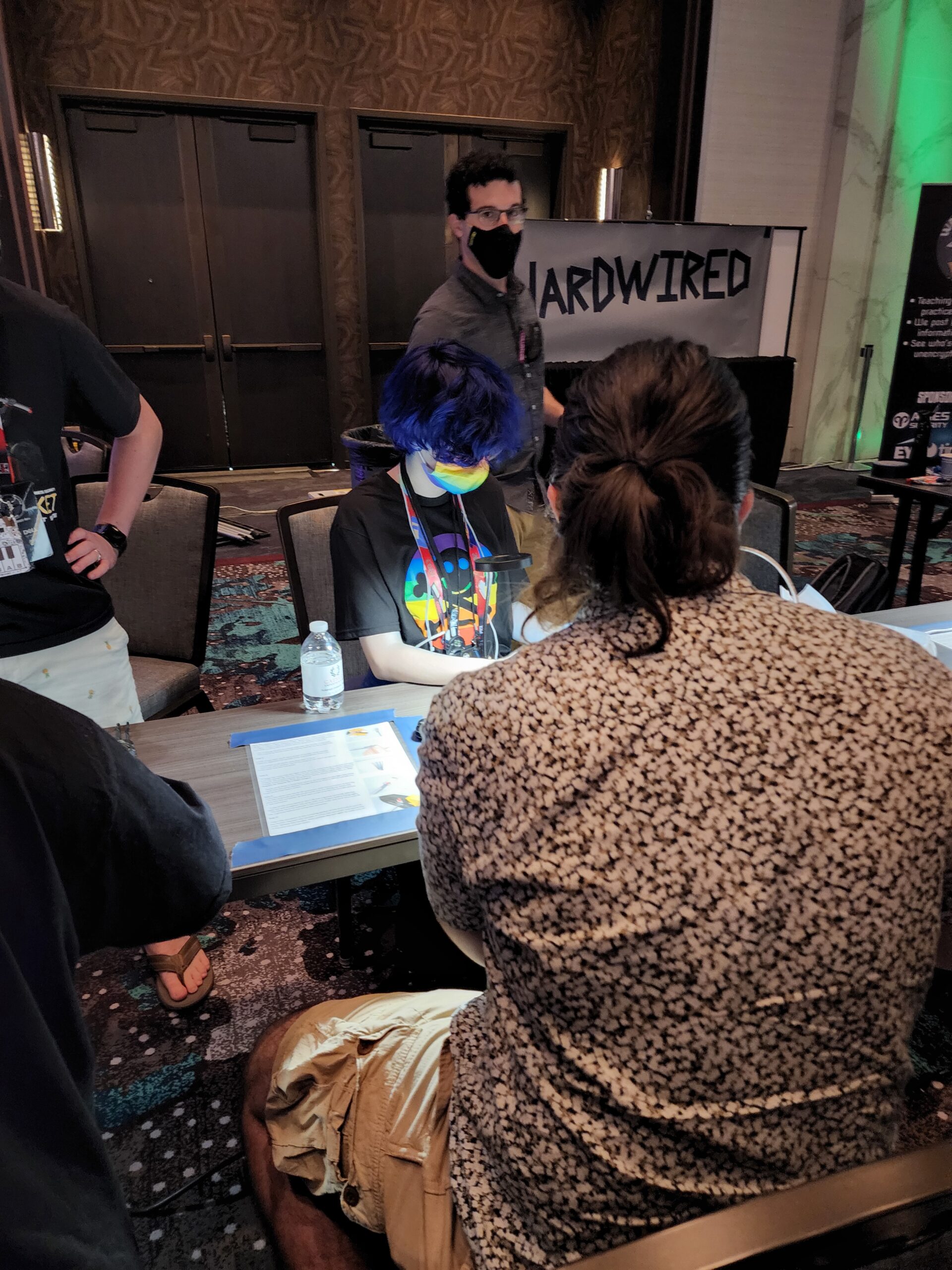 Hackers playing Hardwired at DEF CON 30.